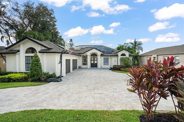 ranch-style home with a garage