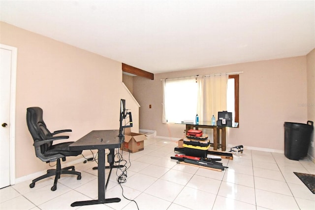 workout room featuring light tile patterned floors