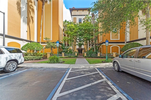 12556 Floridays Resort Dr Unit 207-A, Orlando, FL 32821 - view of uncovered parking lot