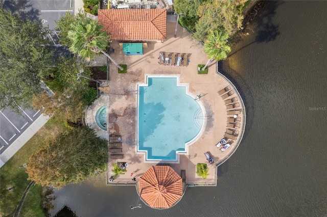 birds eye view of property featuring a water view