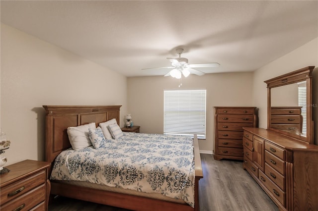 bedroom with light hardwood / wood-style floors and ceiling fan