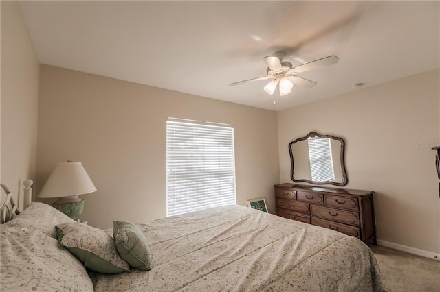 bedroom featuring ceiling fan and carpet floors