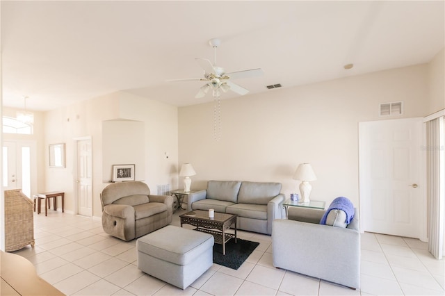 living room with light tile patterned flooring and ceiling fan