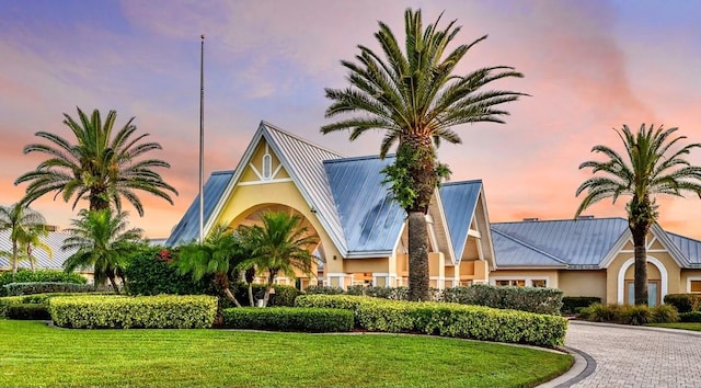 view of outdoor building at dusk