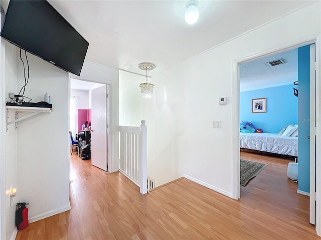 corridor featuring hardwood / wood-style flooring