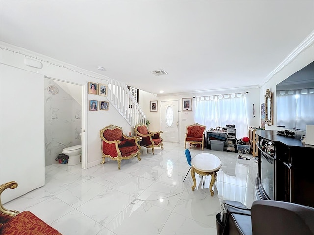 living room with crown molding