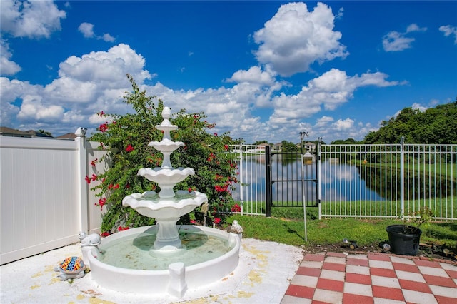 view of patio / terrace featuring a water view