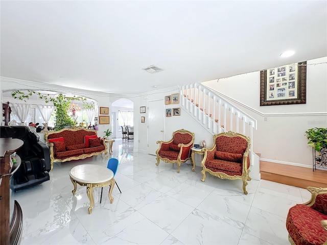 living room featuring ornamental molding