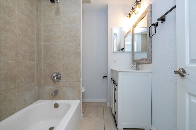 full bathroom with vanity, toilet, tile patterned floors, and tiled shower / bath