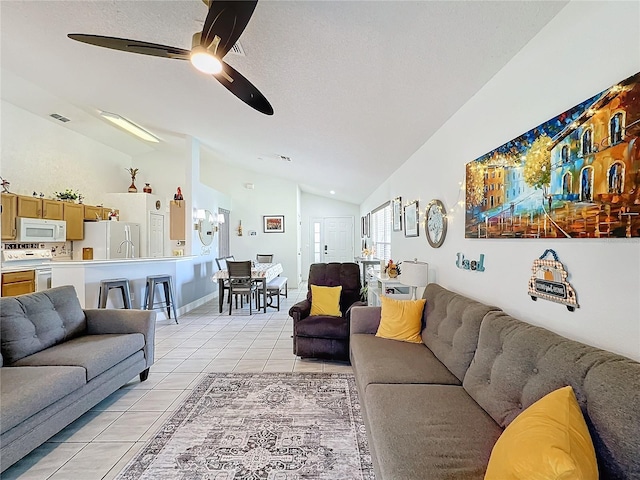 tiled living room with lofted ceiling and ceiling fan