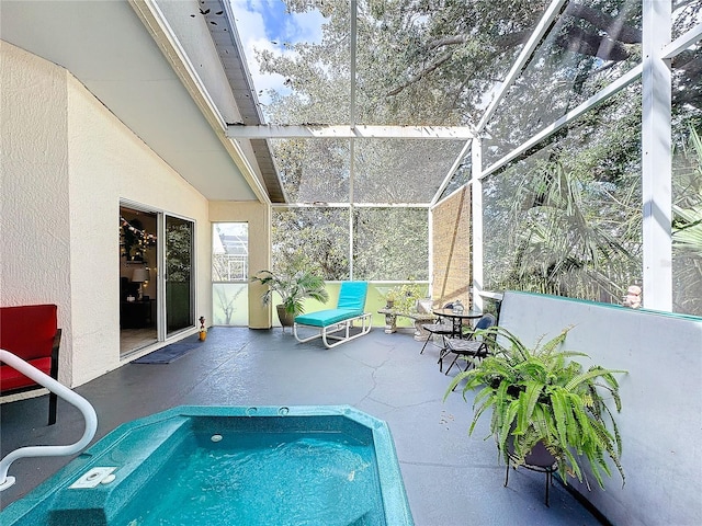 view of pool featuring a lanai and a patio area