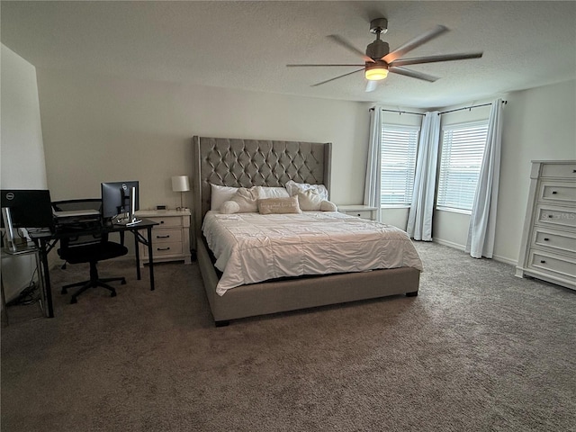 carpeted bedroom with a textured ceiling and ceiling fan