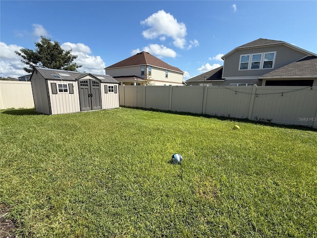 view of yard featuring a storage shed