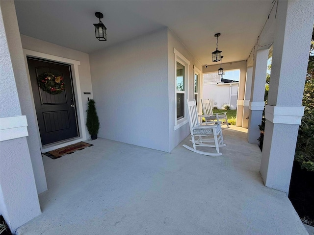 doorway to property with a porch