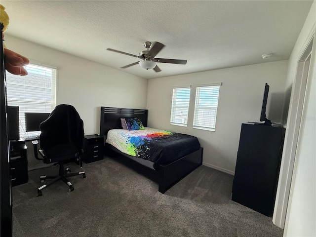 2346 Upland Ln, Apopka, FL 32712 - bedroom with carpet floors, a ceiling fan, an office area, baseboards, and a textured ceiling