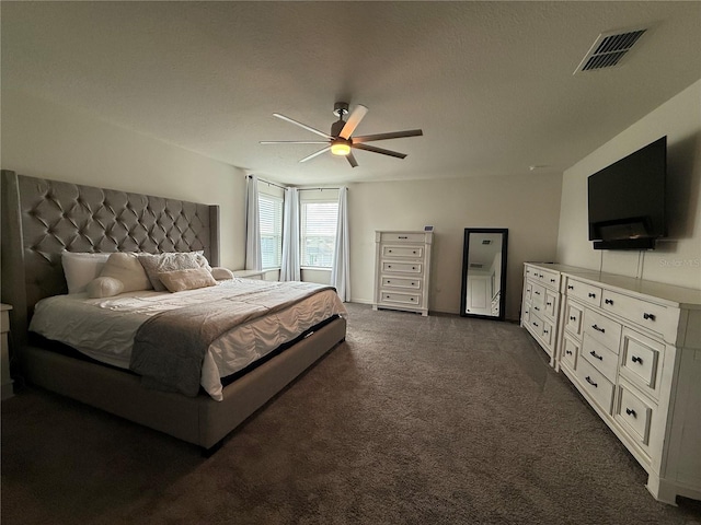 2346 Upland Ln, Apopka, FL 32712 - bedroom with dark colored carpet and ceiling fan