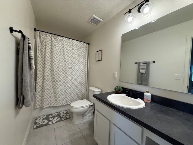 2346 Upland Ln, Apopka, FL 32712 - bathroom featuring vanity, tile patterned floors, toilet, curtained shower, and a textured ceiling