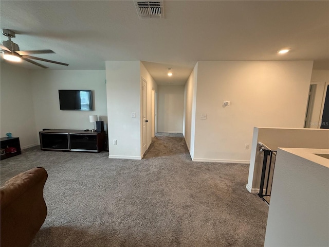 2346 Upland Ln, Apopka, FL 32712 - carpeted living area featuring a ceiling fan, baseboards, and recessed lighting