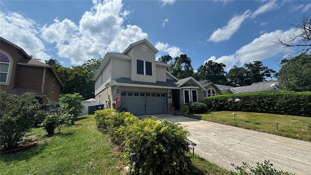 view of front of property featuring a garage, central AC, and a front yard