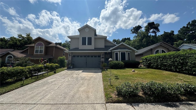 view of front facade featuring a garage and a front lawn