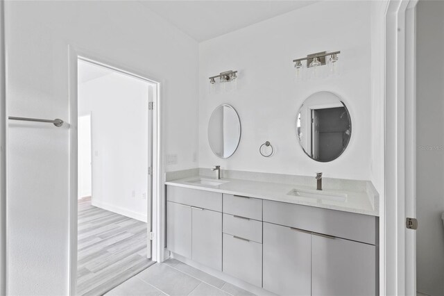 16941 SW 30th Avenue Rd SW, Ocala, FL 34473 - full bathroom with tile patterned flooring, double vanity, and a sink