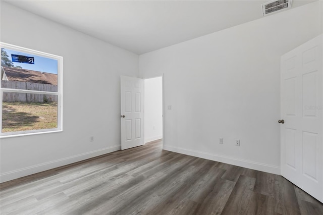16941 SW 30th Avenue Rd SW, Ocala, FL 34473 - empty room featuring wood finished floors, baseboards, and visible vents