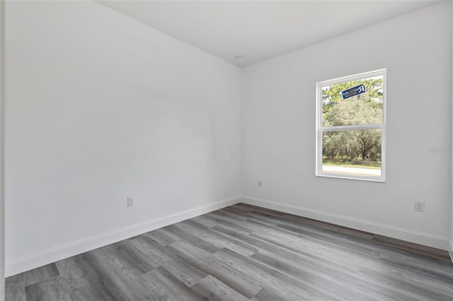 16941 SW 30th Avenue Rd SW, Ocala, FL 34473 - unfurnished room featuring dark wood-type flooring and baseboards