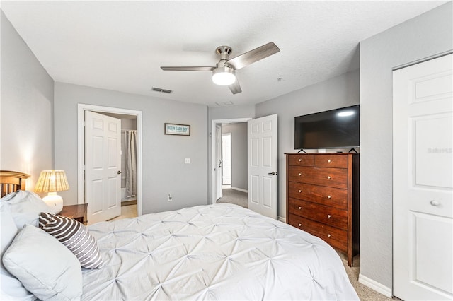 carpeted bedroom featuring ceiling fan