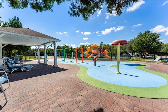 view of playground featuring a gazebo and a patio