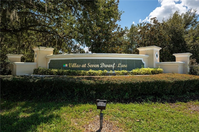 view of community sign