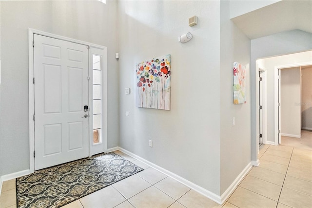 entrance foyer featuring light tile patterned floors