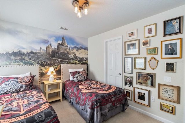 bedroom featuring light carpet