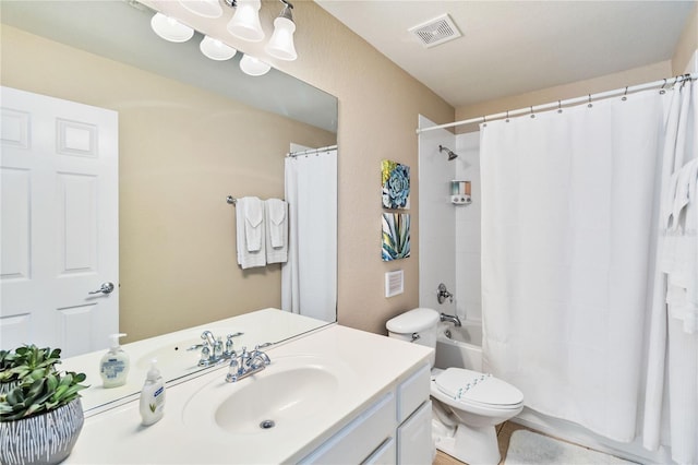 full bathroom with toilet, shower / tub combo, and vanity