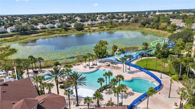 drone / aerial view with a water view