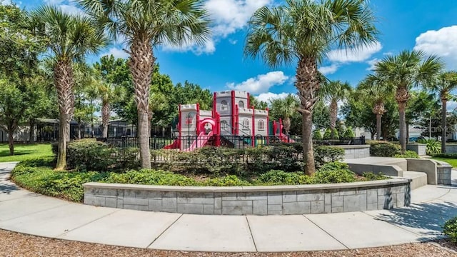 view of home's community featuring a playground