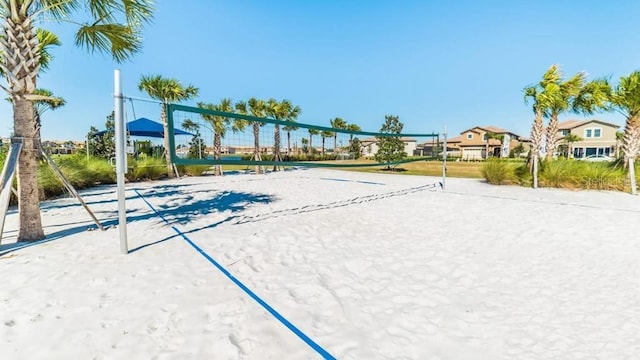 view of property's community featuring volleyball court