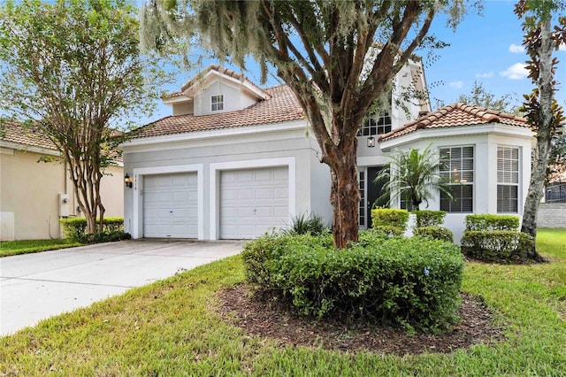 mediterranean / spanish-style house featuring a garage