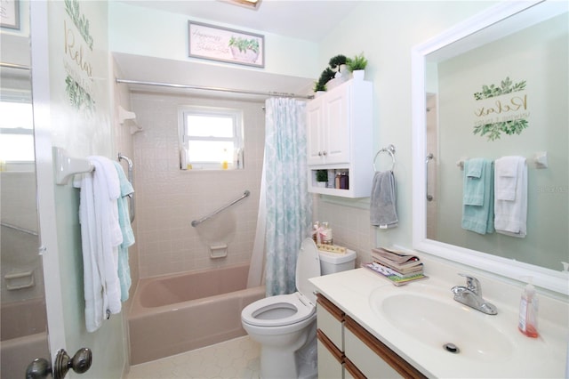 full bathroom with shower / bath combo, vanity, and toilet