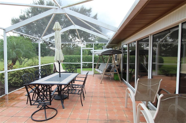 sunroom / solarium with lofted ceiling