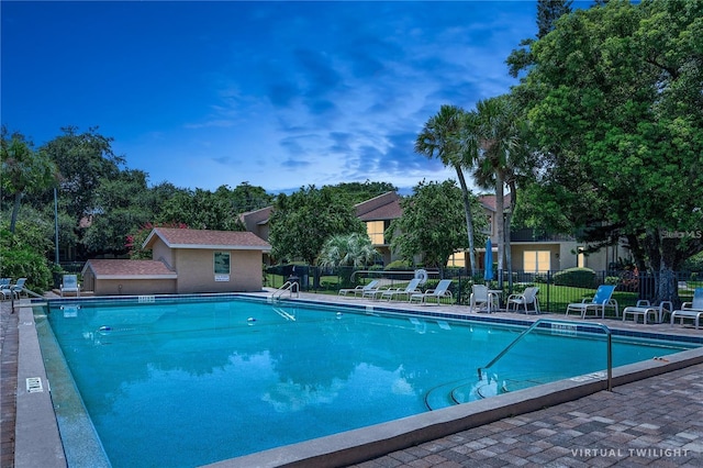 view of swimming pool featuring a patio