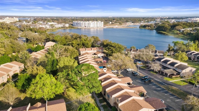 drone / aerial view with a water view