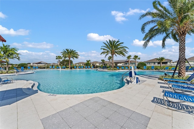 view of swimming pool featuring a patio area