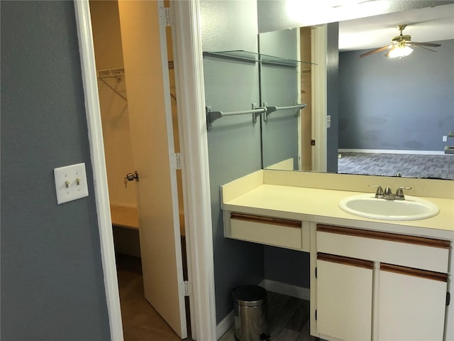 bathroom with vanity and ceiling fan