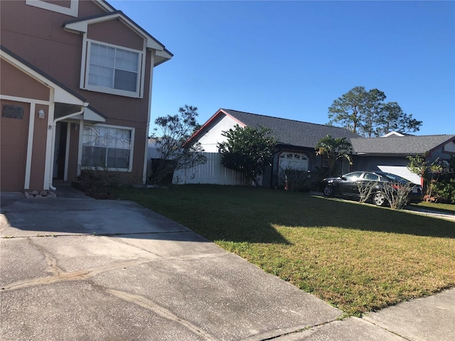 view of front of home with a front lawn