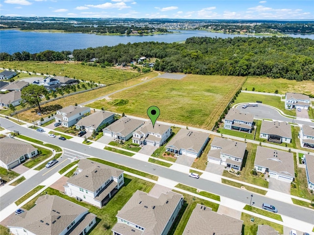 bird's eye view with a water view