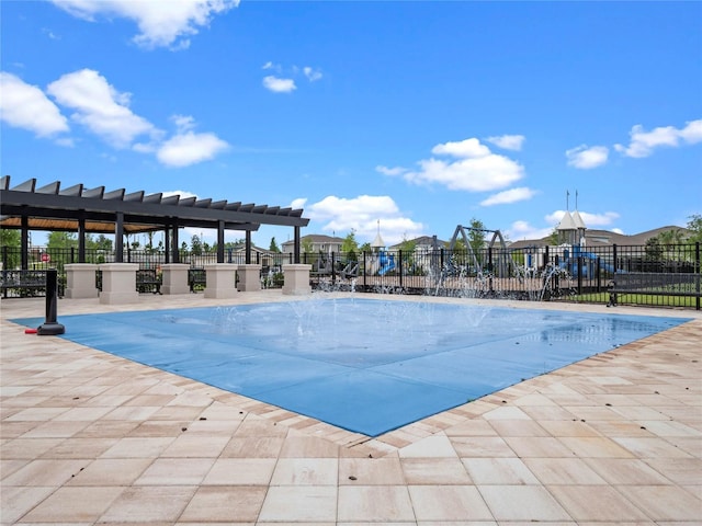 view of swimming pool with a patio