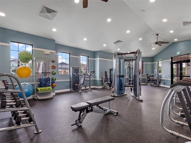 exercise room featuring vaulted ceiling and ceiling fan