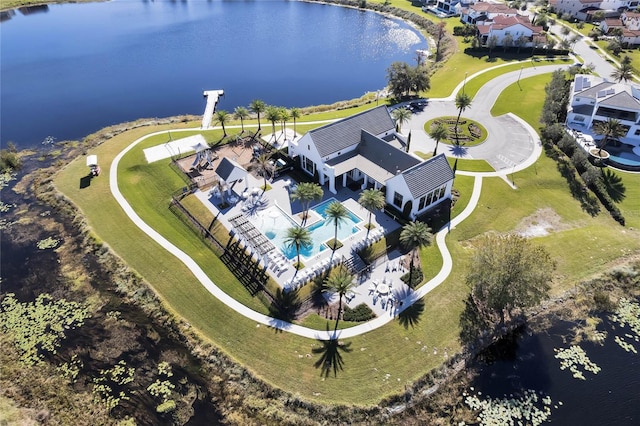 bird's eye view with a water view