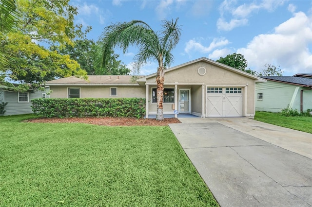 single story home featuring a front yard and a garage