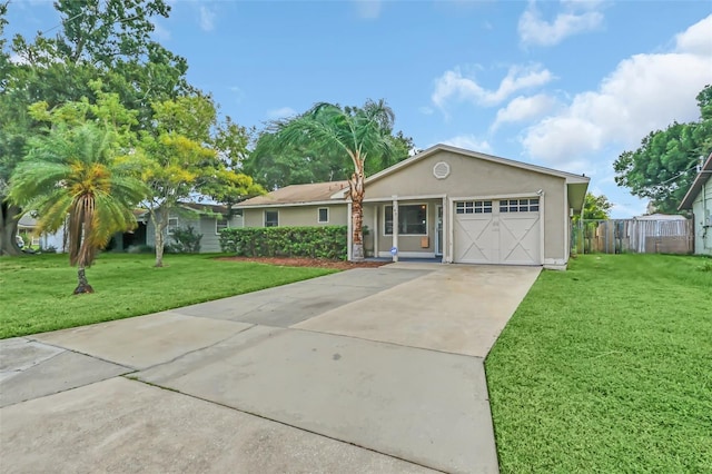 ranch-style home featuring a front yard and a garage